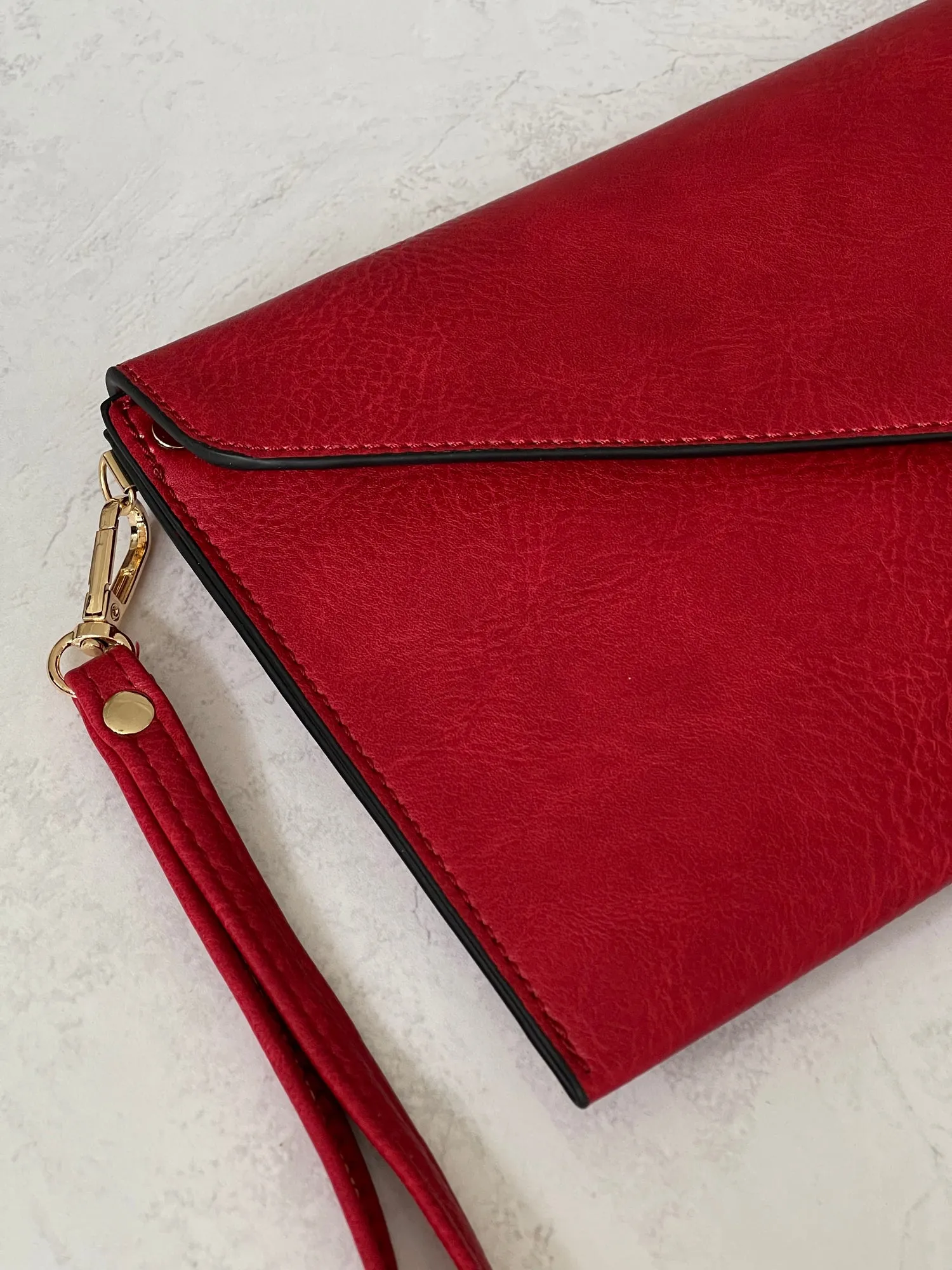 DEEP RED OVER-SIZED ENVELOPE CLUTCH BAG WITH LONG CROSS BODY AND WRISTLET STRAP